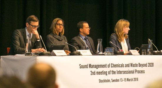 A panel of four persons on a podium at the SAICM 2020 conference