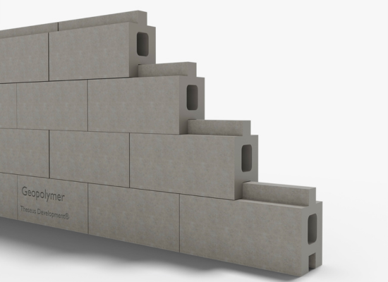 Grey, lego-like building blocks of cement like material stuck together